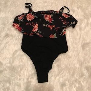 Black and rose print body suit